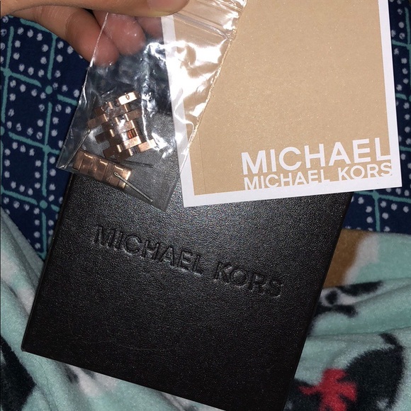 rose gold michael korda watch.